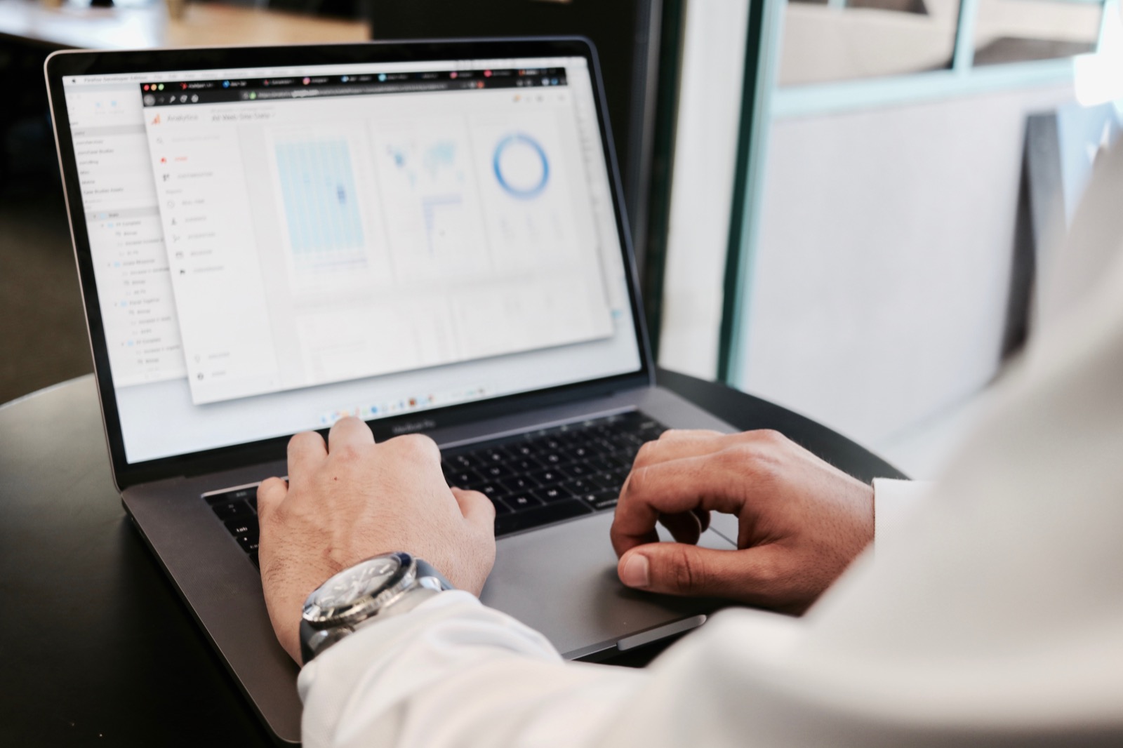 Team analyzing sales data on a screen