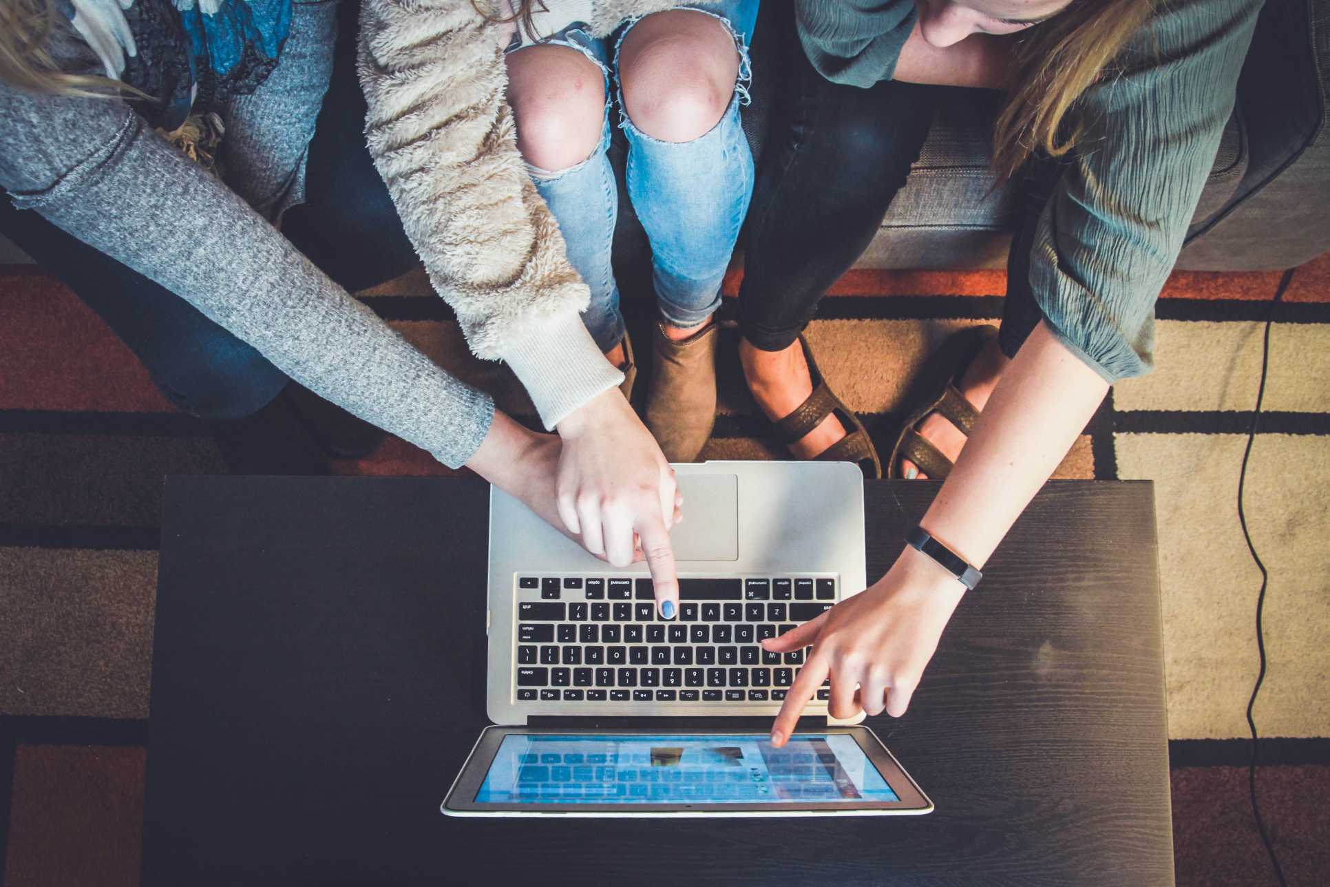 Team working together at a laptop